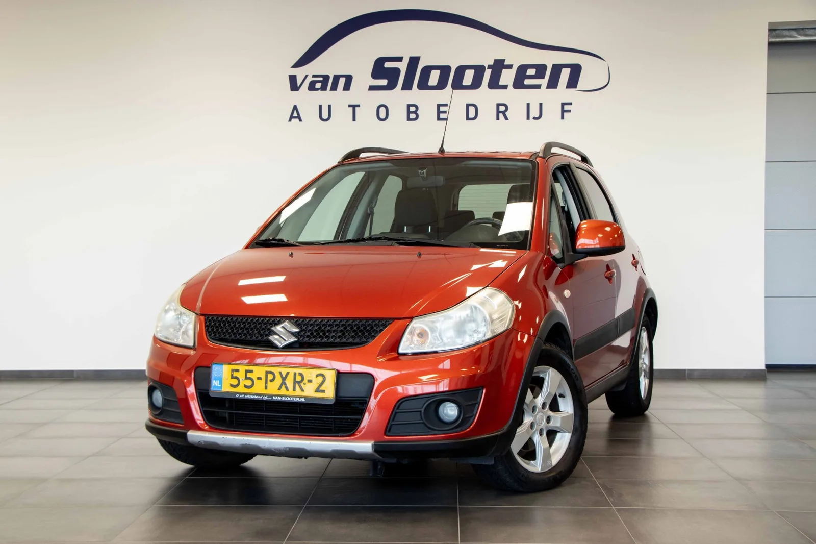 Suzuki SX4 (2011) — foto 1