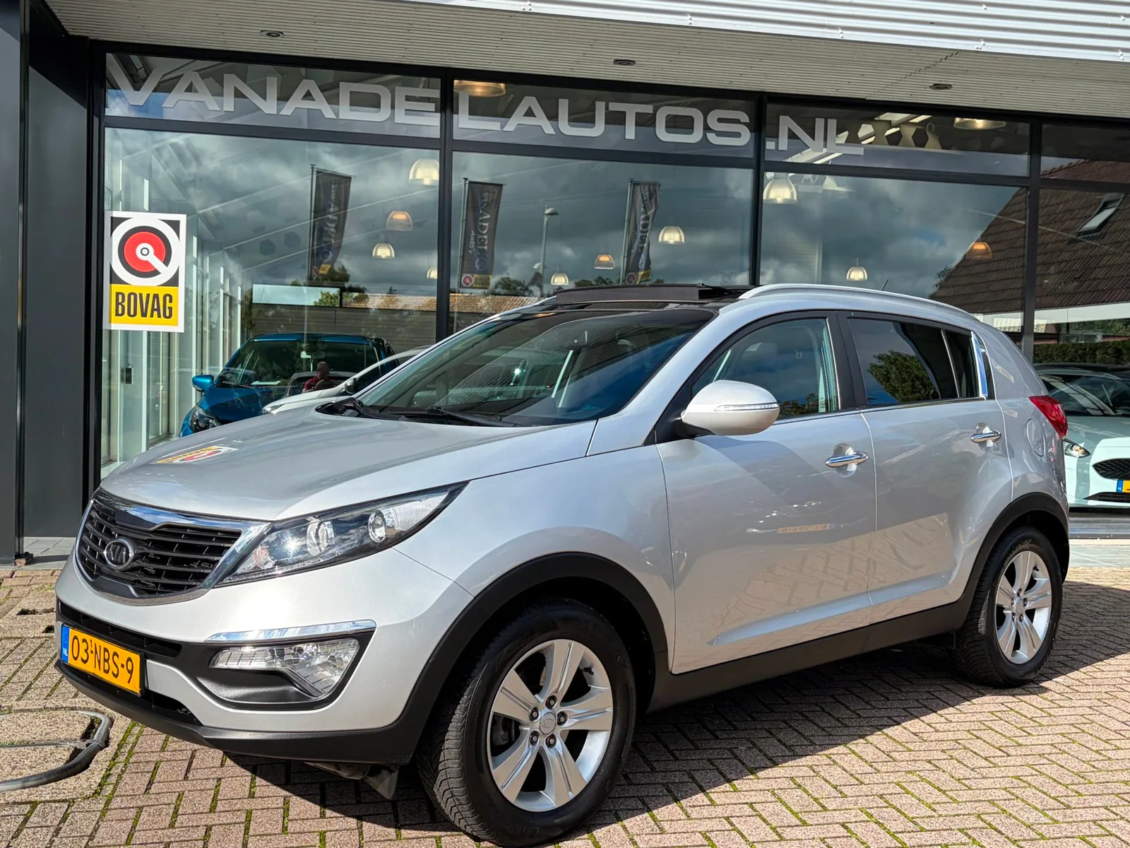 Kia Sportage (2010) — foto 1