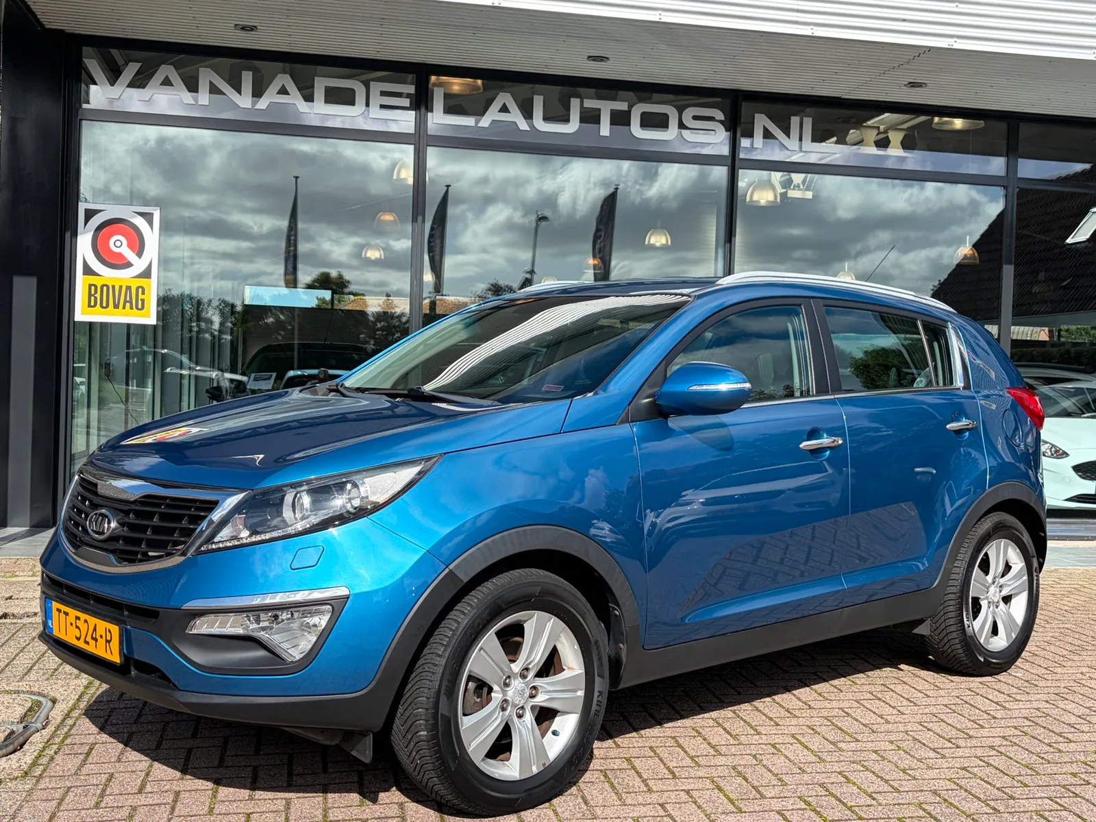 Kia Sportage (2010) — foto 1