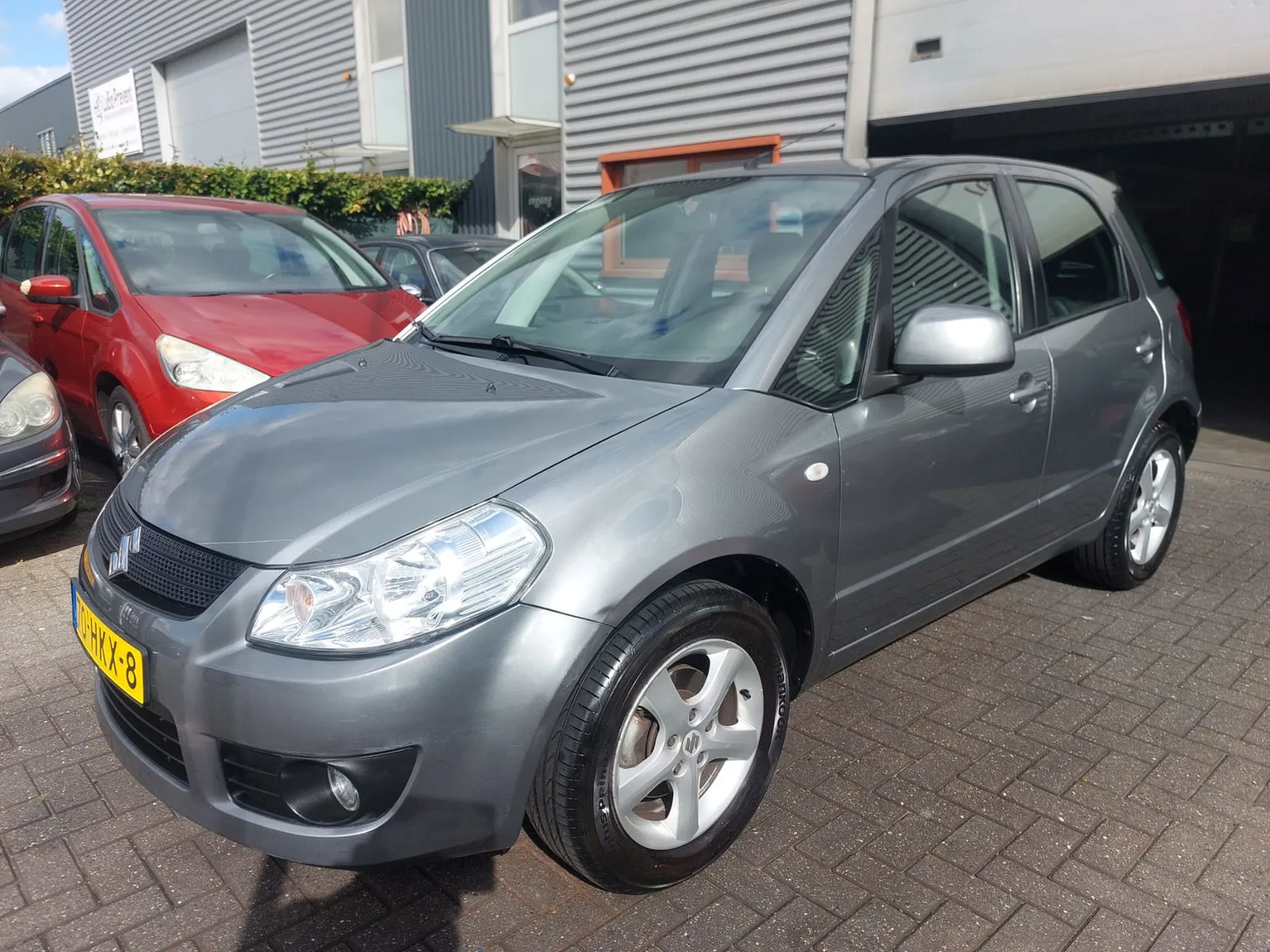 Suzuki SX4 (2009) — foto 1