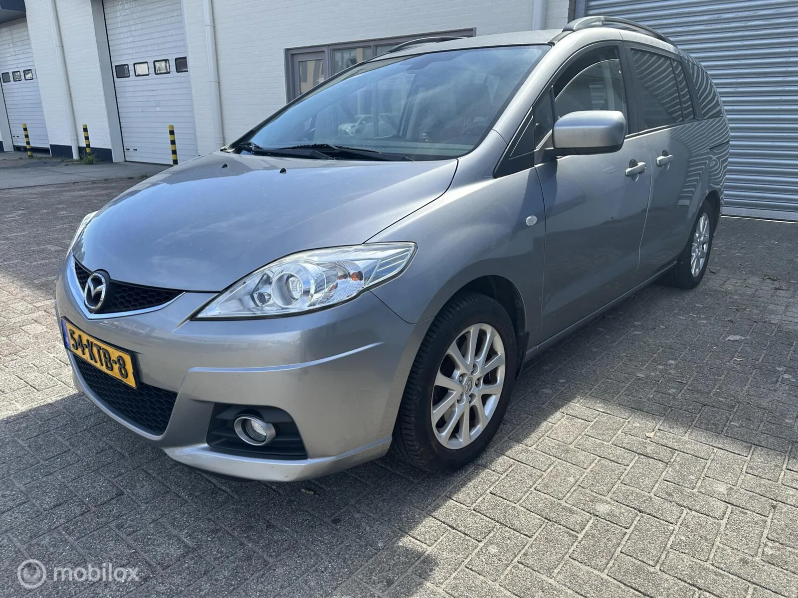 Mazda 5 (2010) — foto 1
