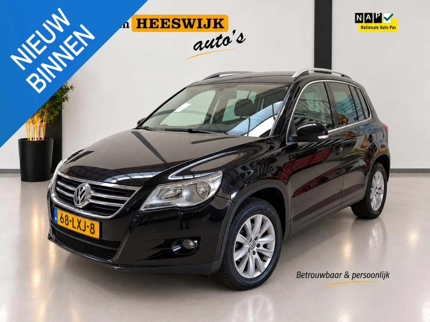 Volkswagen Tiguan (2010) — foto 1
