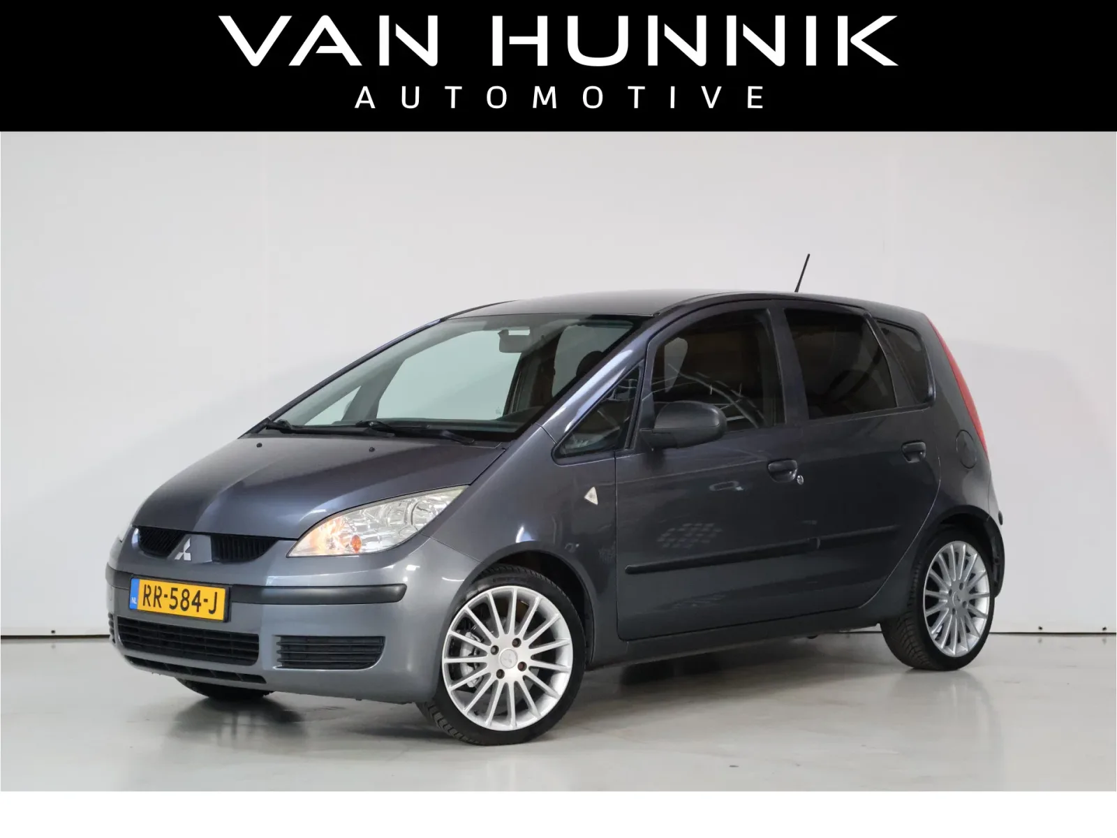 Mitsubishi Colt (2008) — foto 1