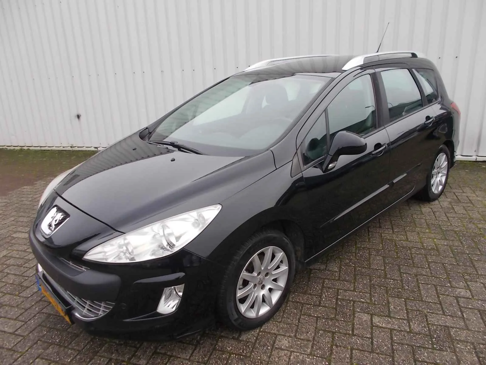 Peugeot 308 (2009) — foto 1