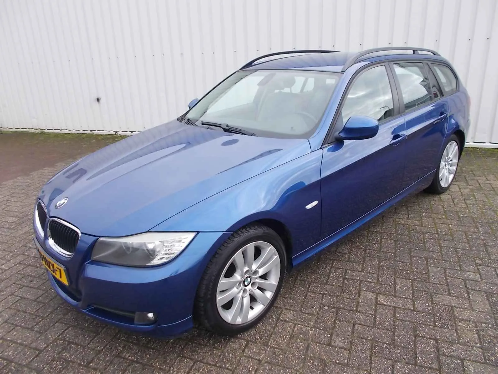 BMW 3-Serie (2009) — foto 1