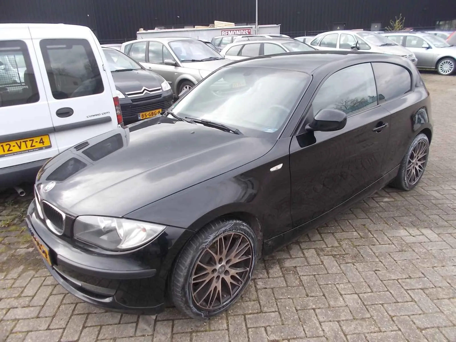 BMW 1-Serie (2010) — foto 1