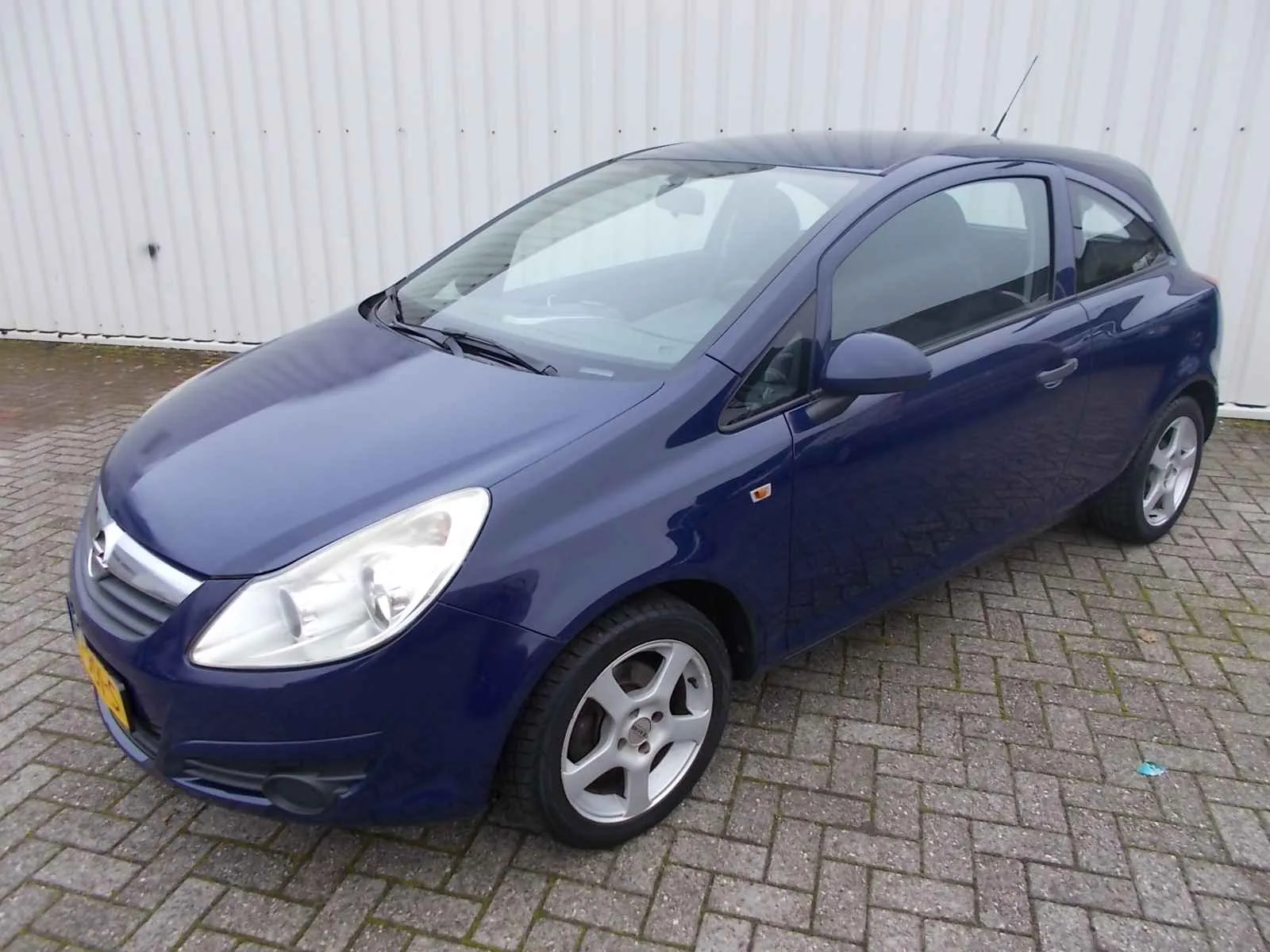 Opel Corsa (2009) — foto 1