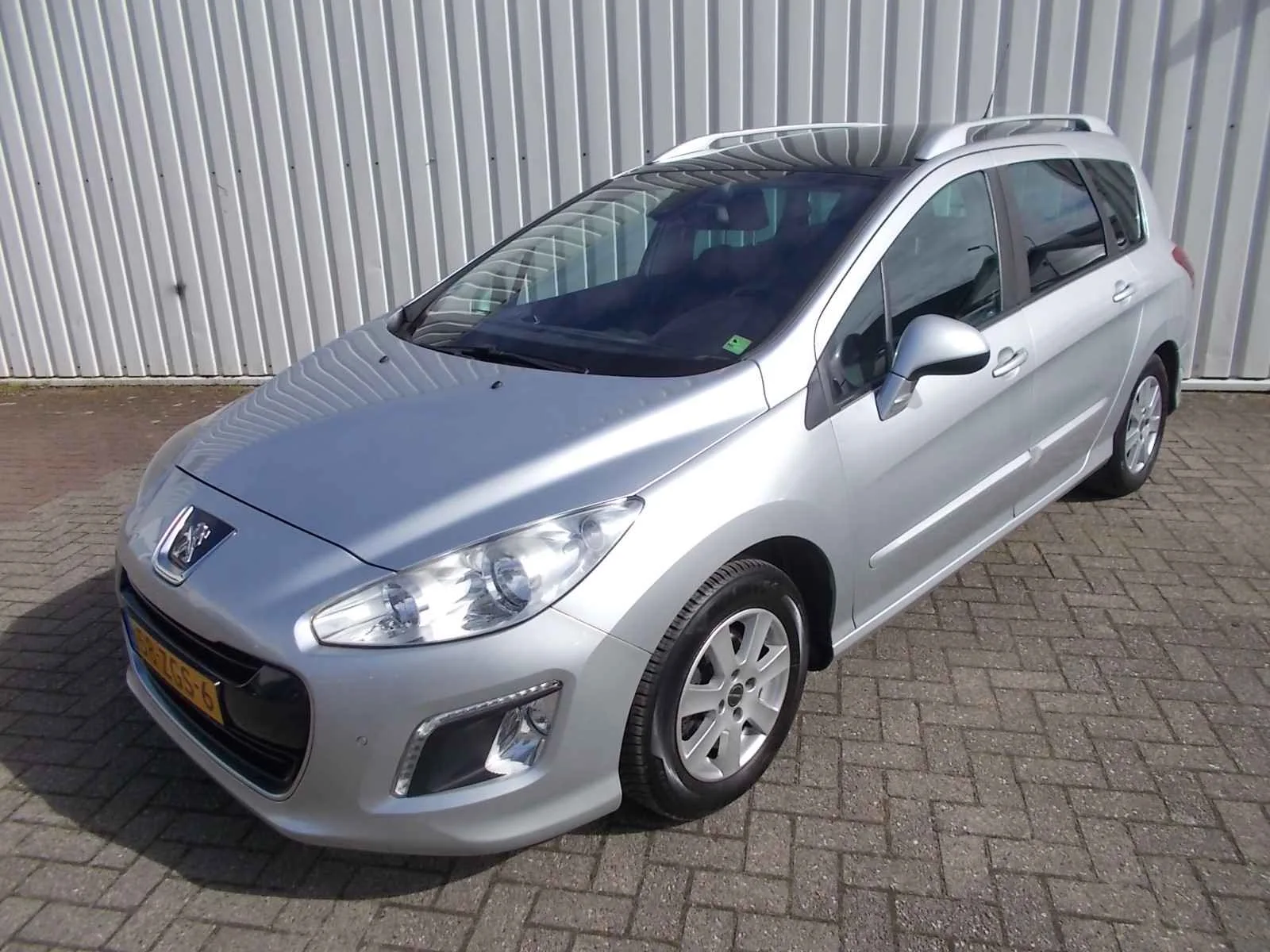 Peugeot 308 (2012) — foto 1