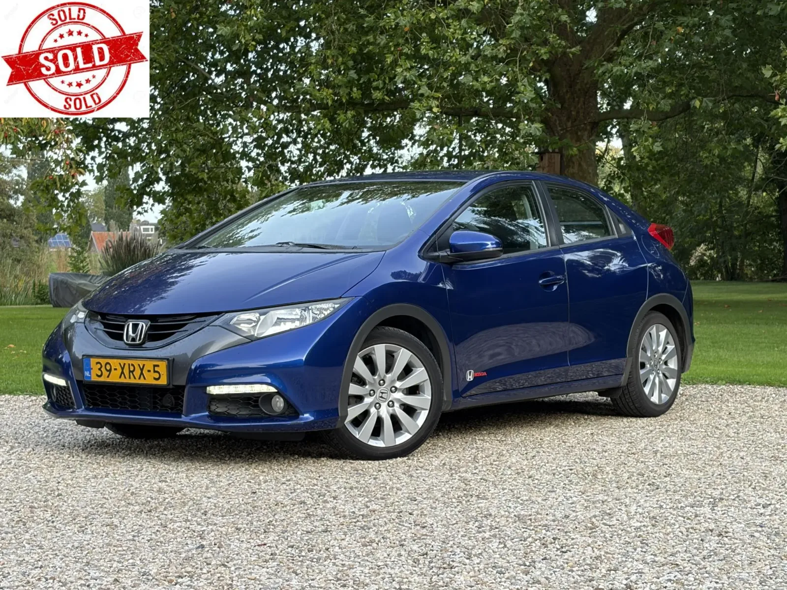 Honda Civic (2012) — foto 1
