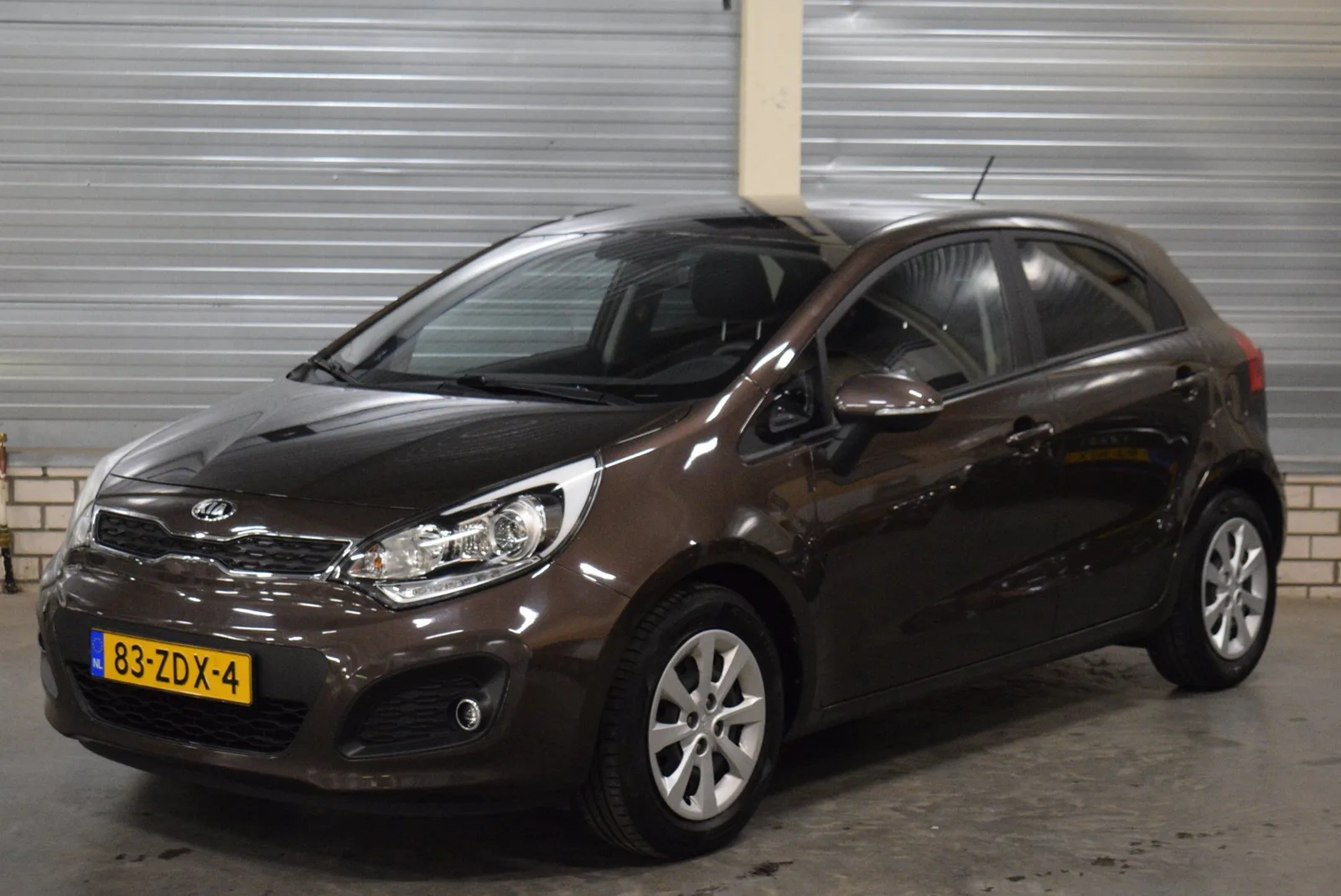 Kia Rio (2012) — foto 1