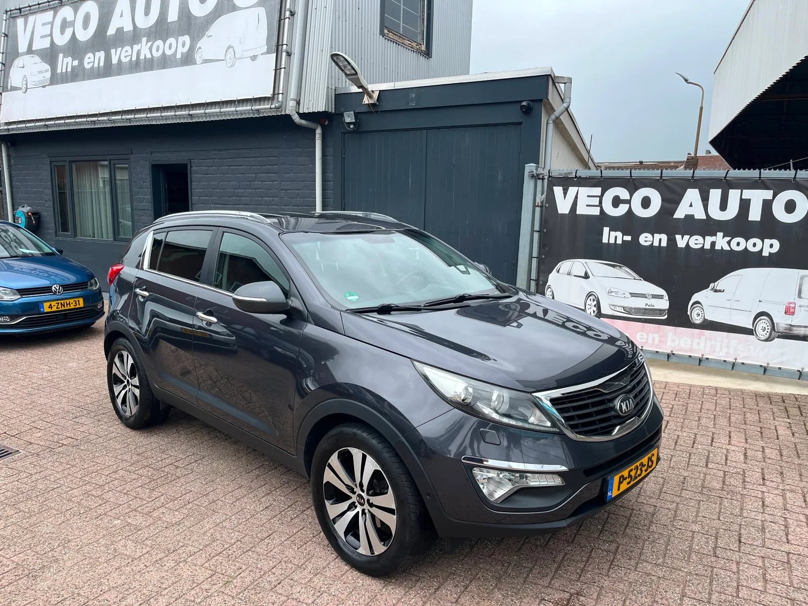 Kia Sportage (2012) — foto 1