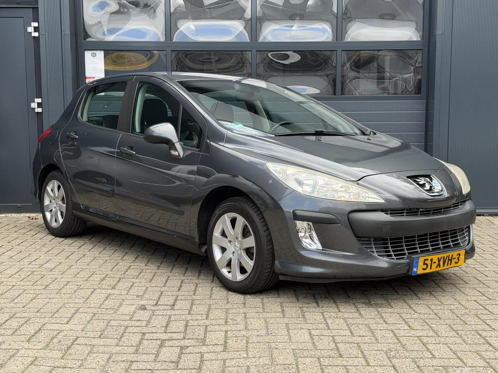 Peugeot 308 (2008) — foto 1