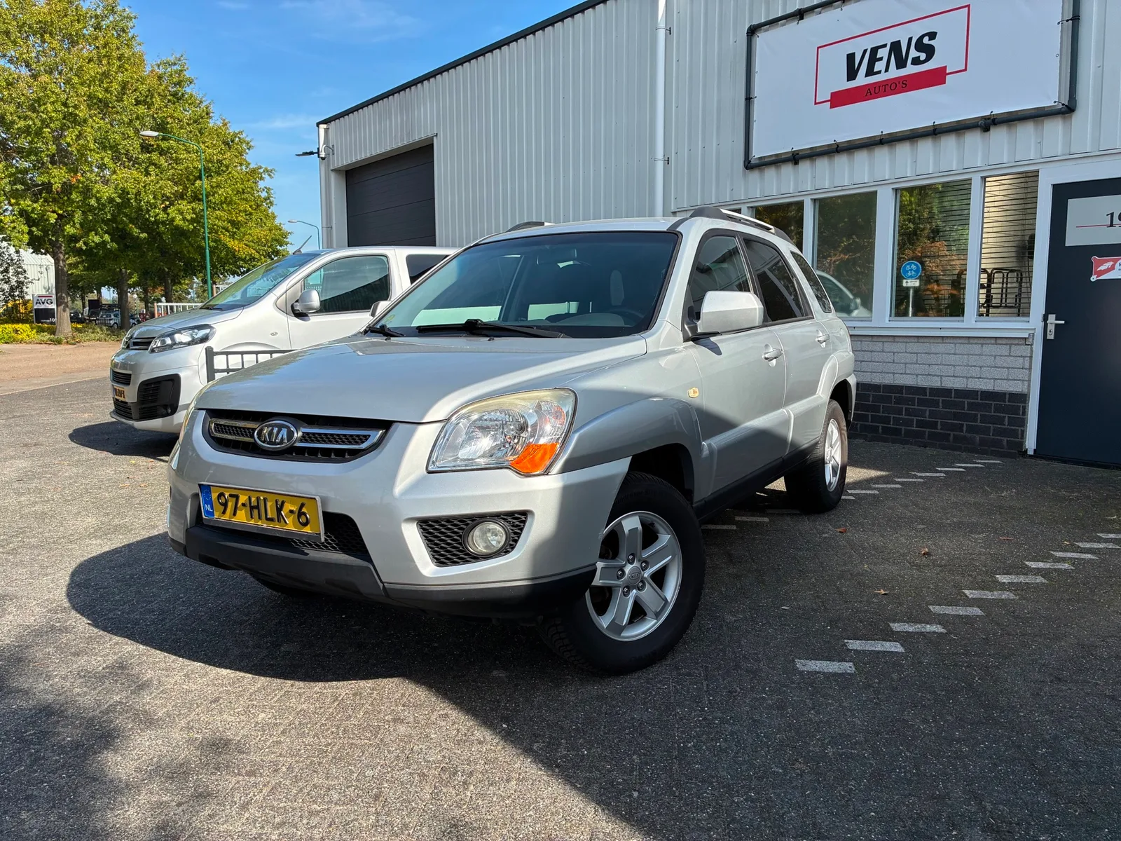 Kia Sportage (2009) — foto 1
