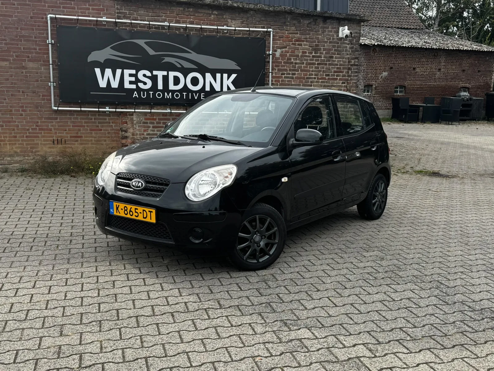 Kia Picanto (2009) — foto 1