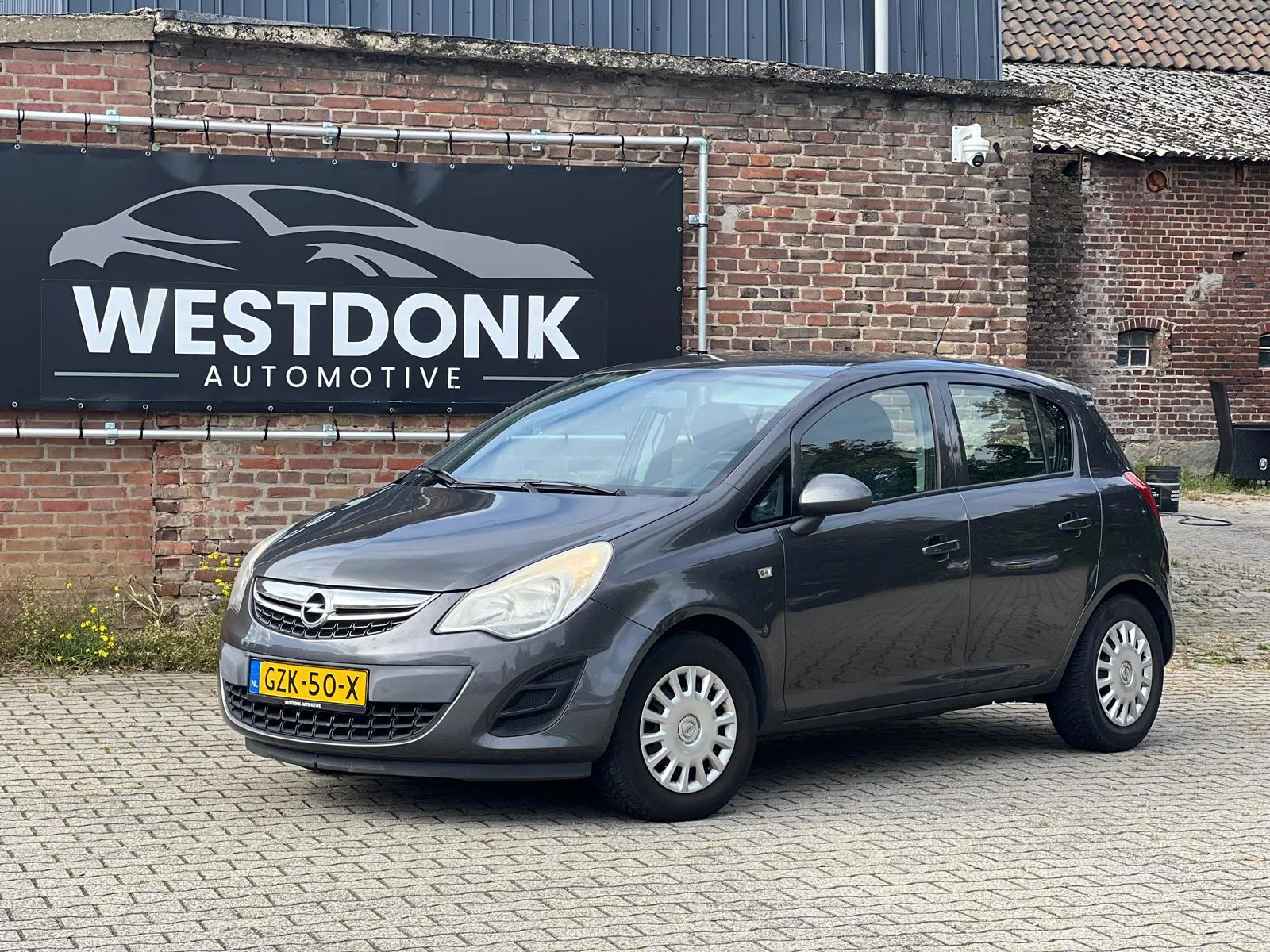Opel Corsa (2011) — foto 1