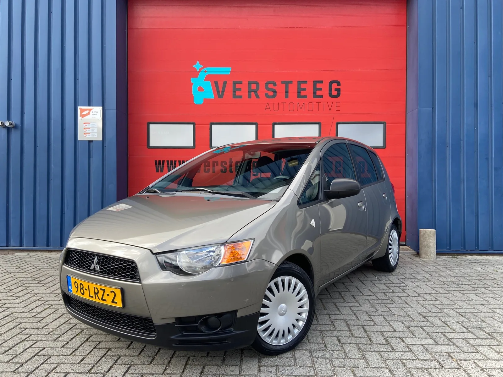 Mitsubishi Colt (2010) — foto 1