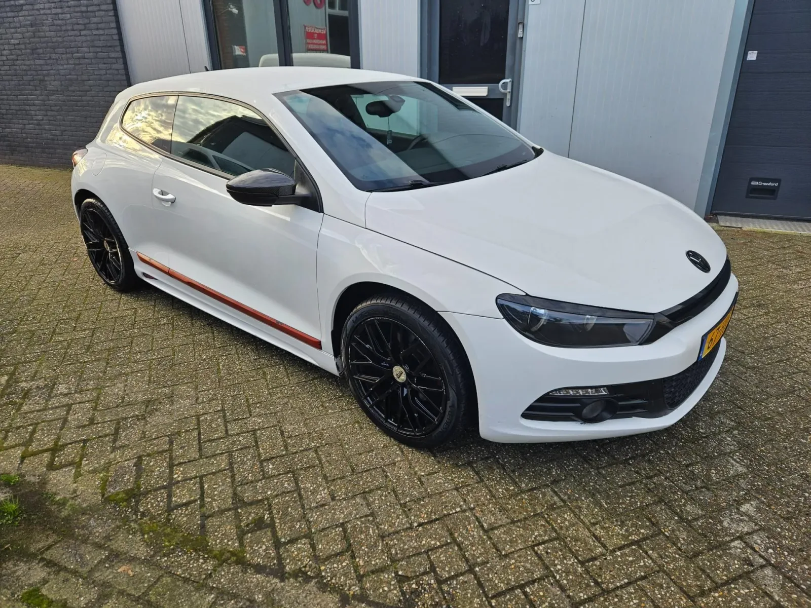 Volkswagen Scirocco (2009) — foto 1