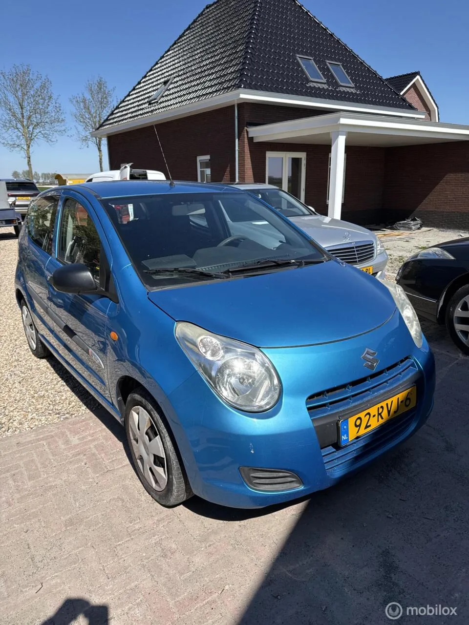 Suzuki Alto (2011) — foto 1