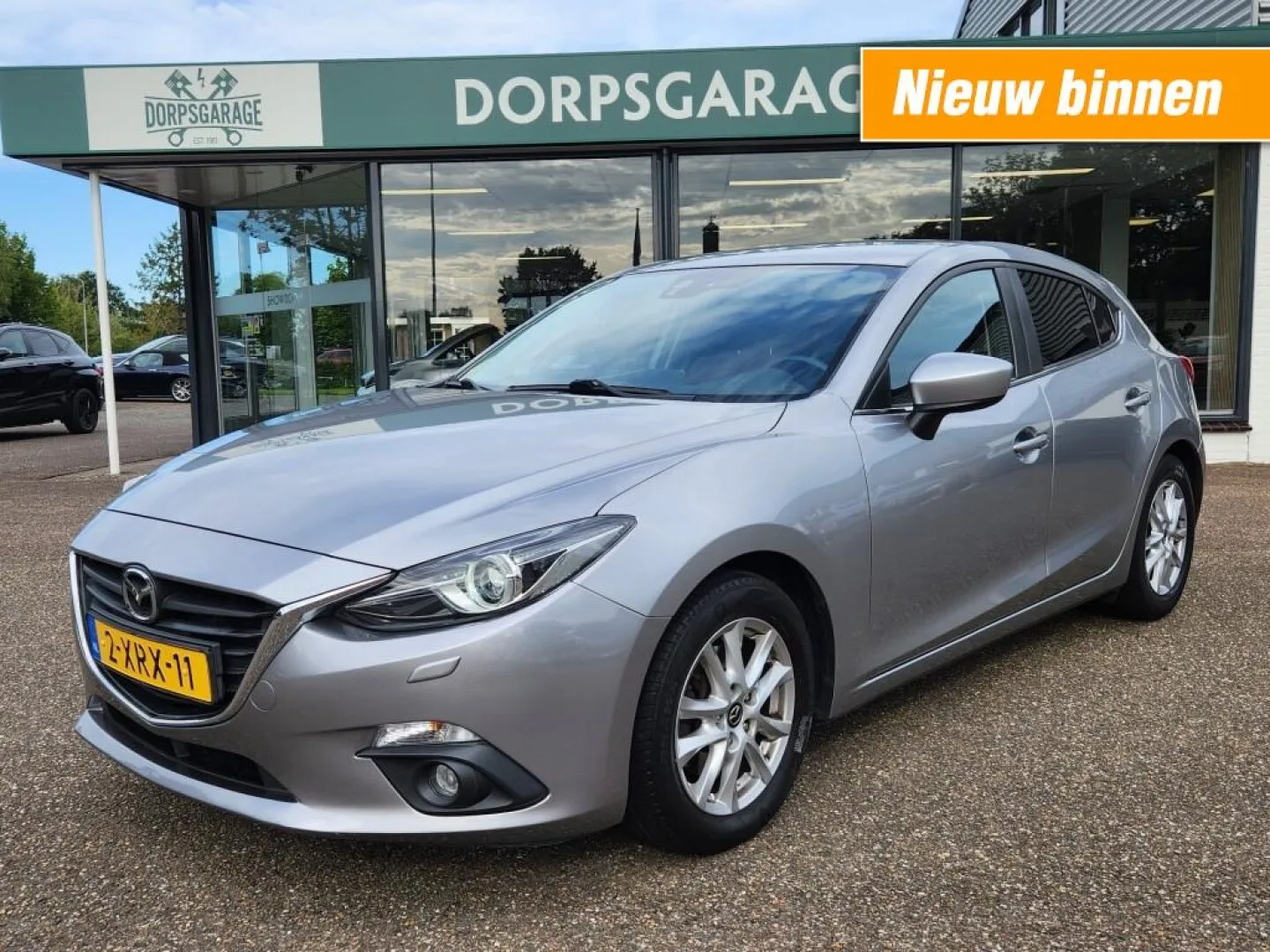Mazda 3 (2014) — foto 1