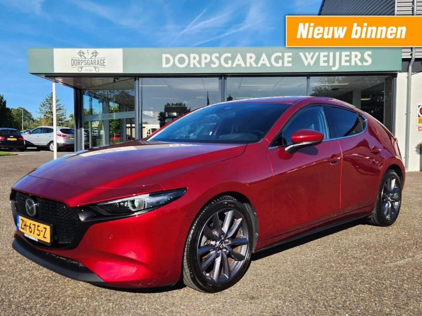 Mazda 3 (2019) — foto 1
