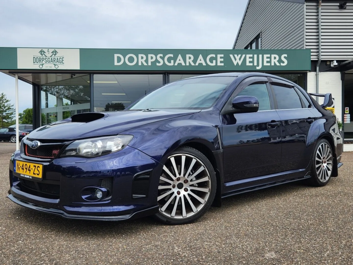 Subaru WRX STI (2011) — foto 1