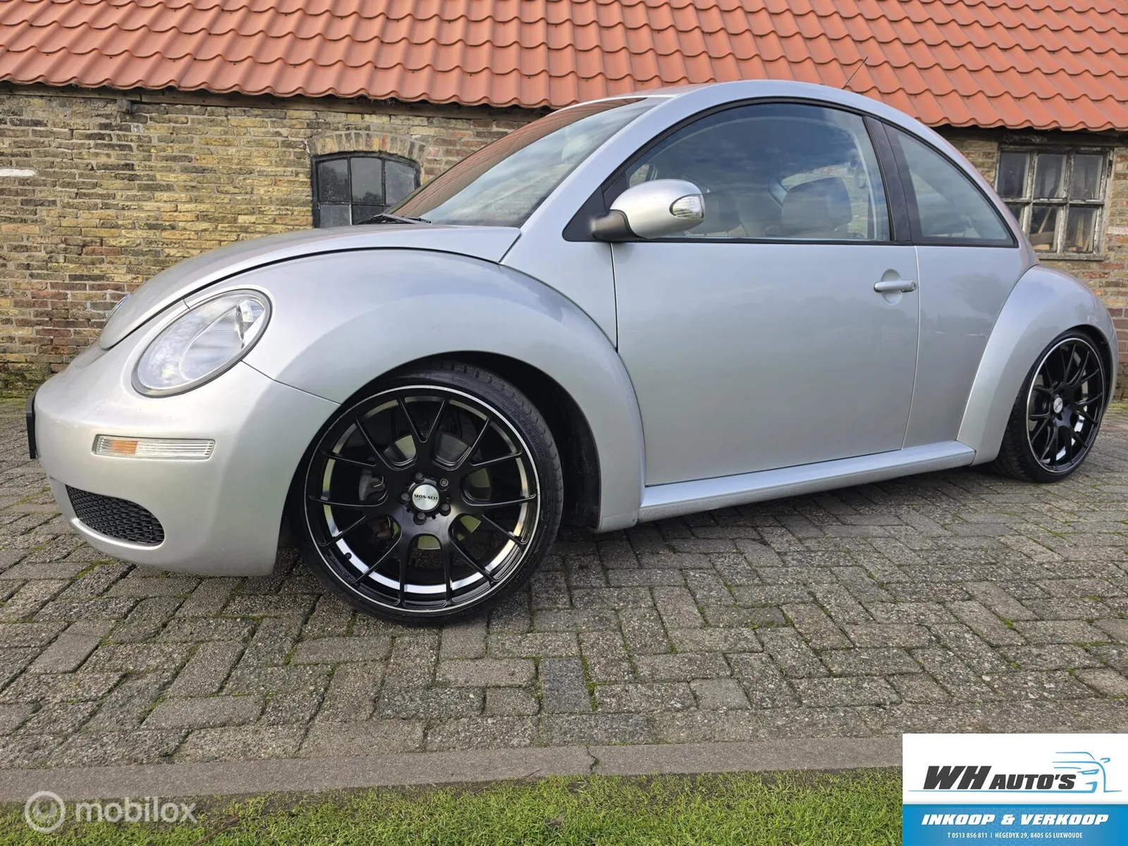 Volkswagen New Beetle (2006) — foto 1