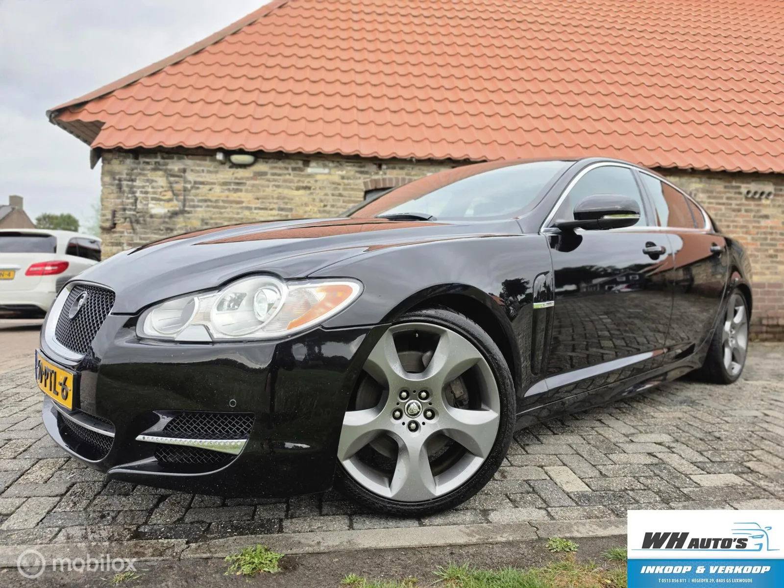Jaguar XF (2011) — foto 1