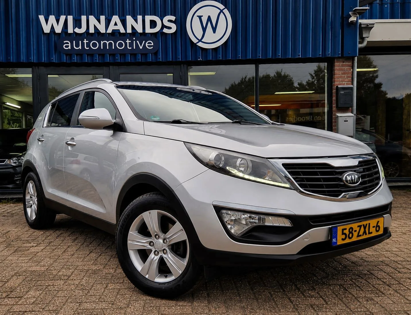 Kia Sportage (2013) — foto 1
