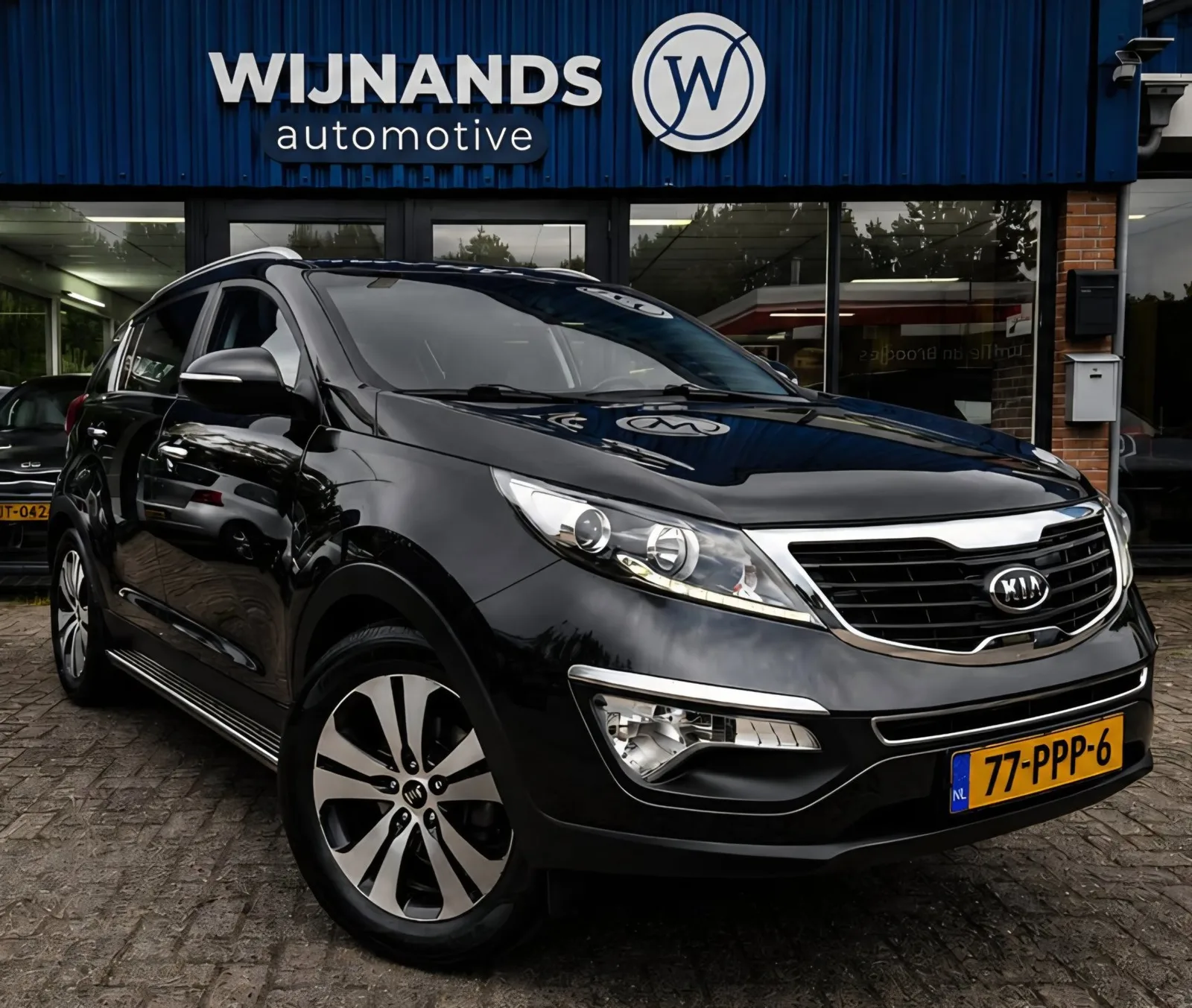 Kia Sportage (2011) — foto 1