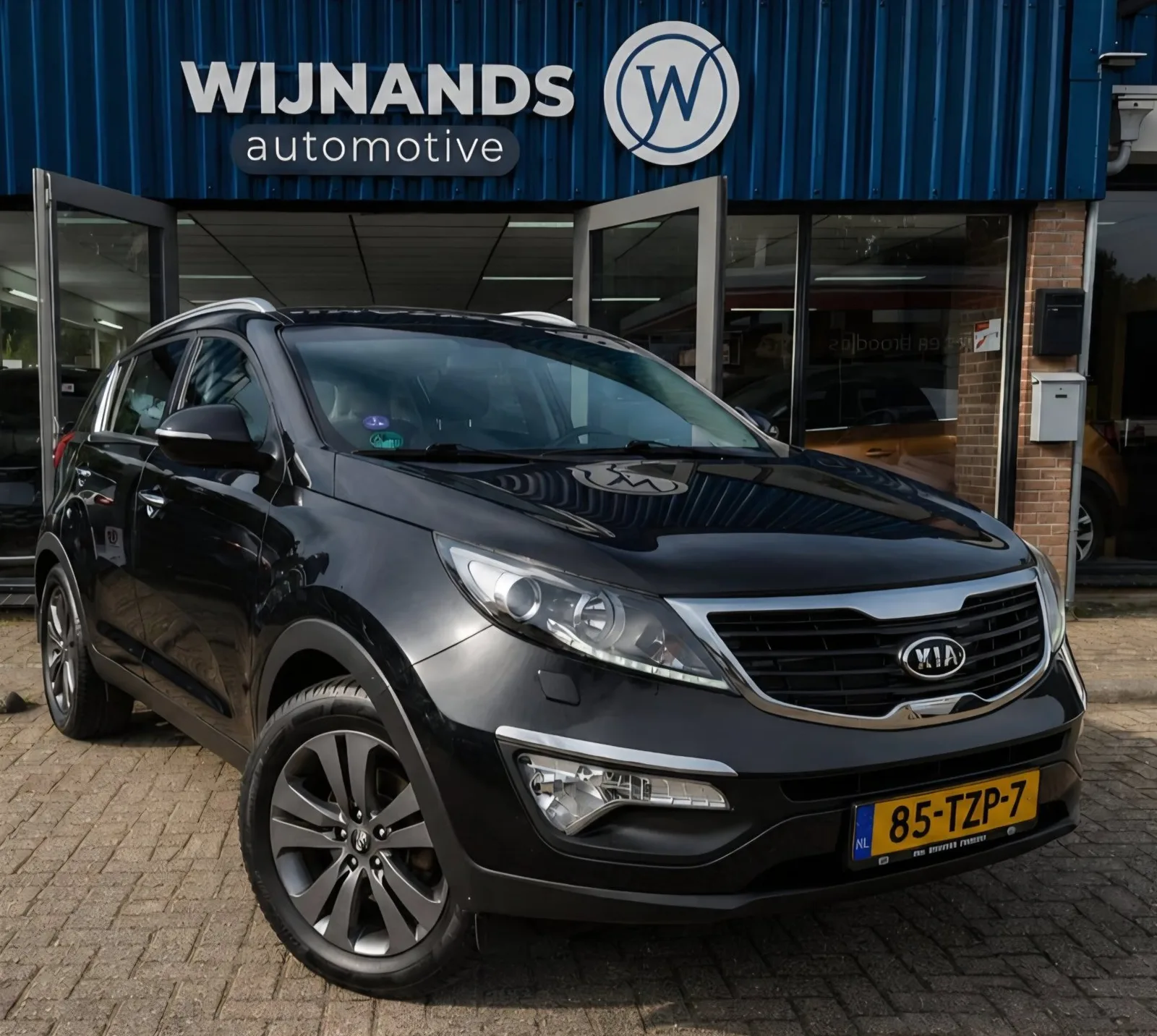 Kia Sportage (2012) — foto 1