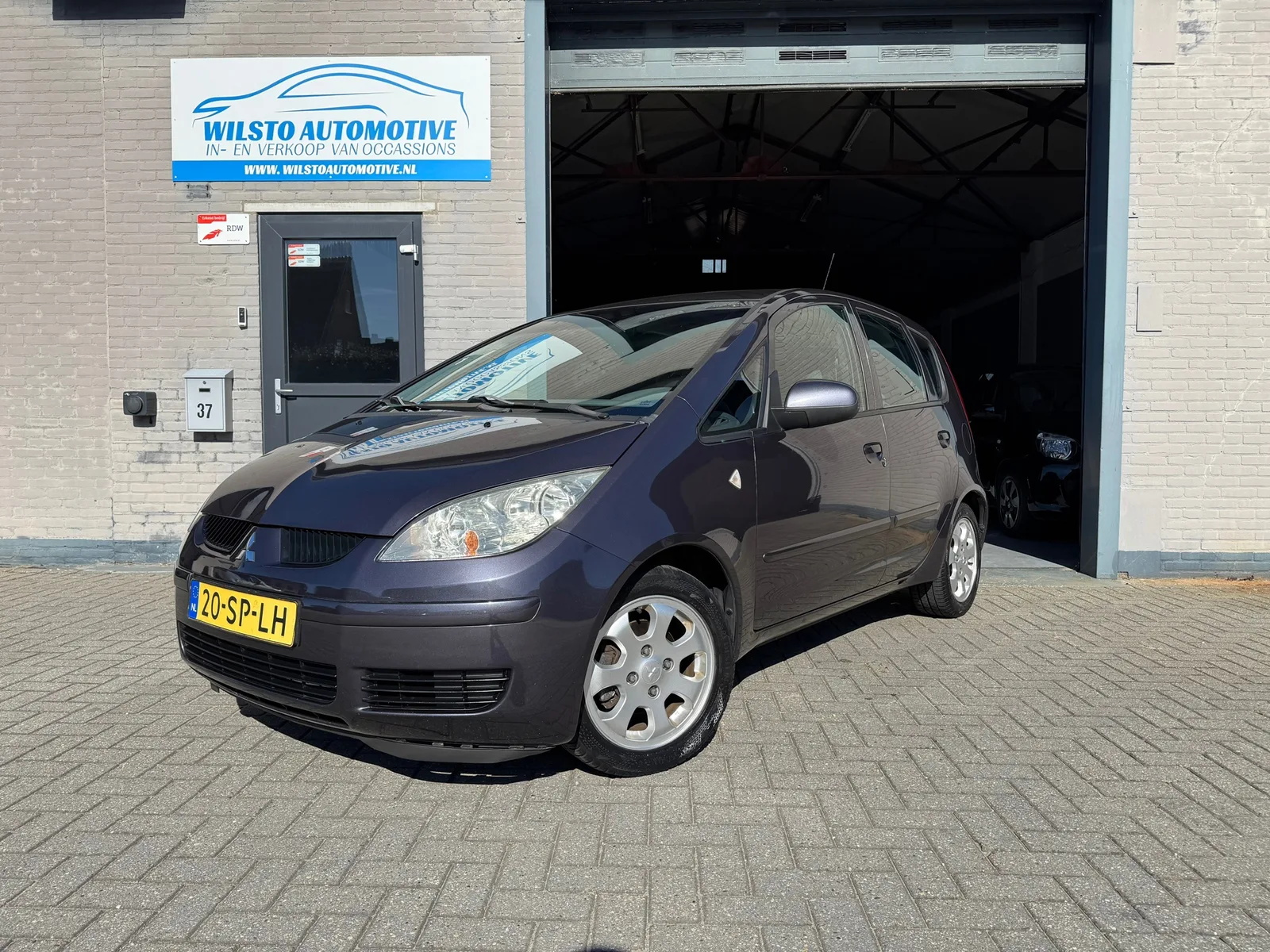Mitsubishi Colt (2006) — foto 1