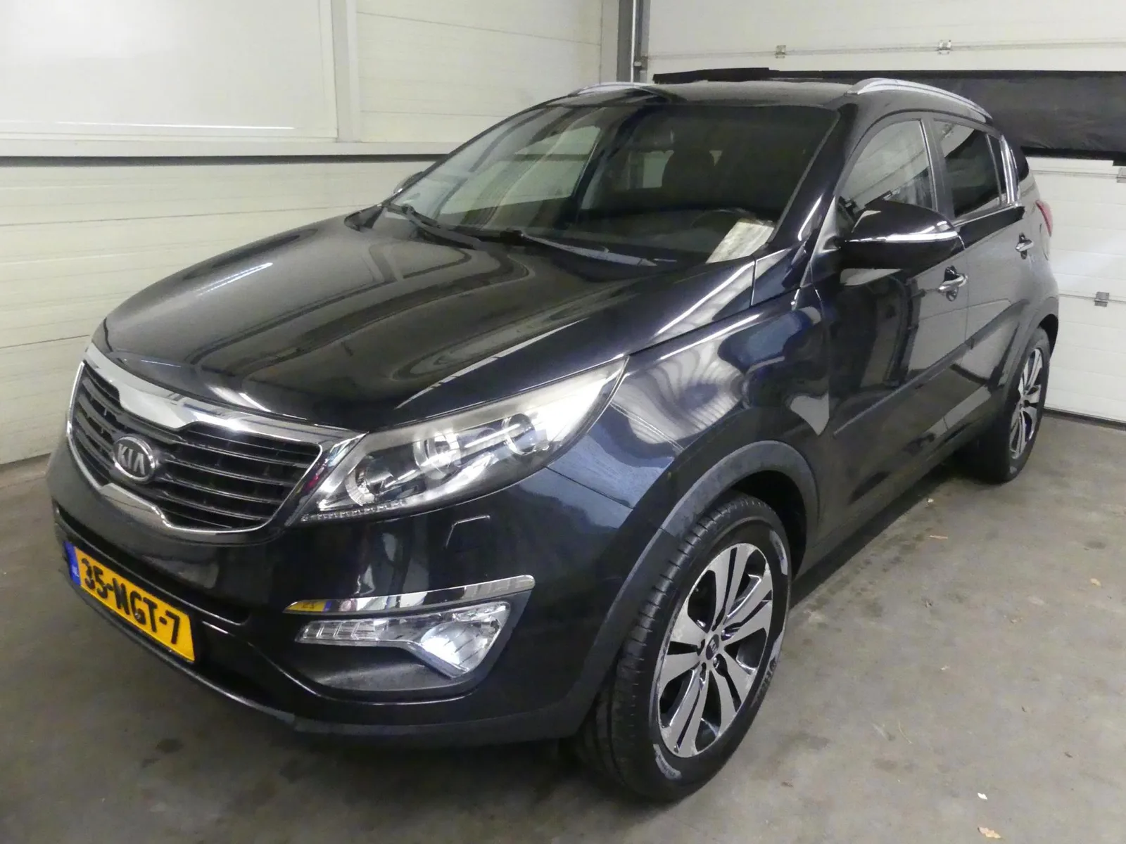 Kia Sportage (2010) — foto 1