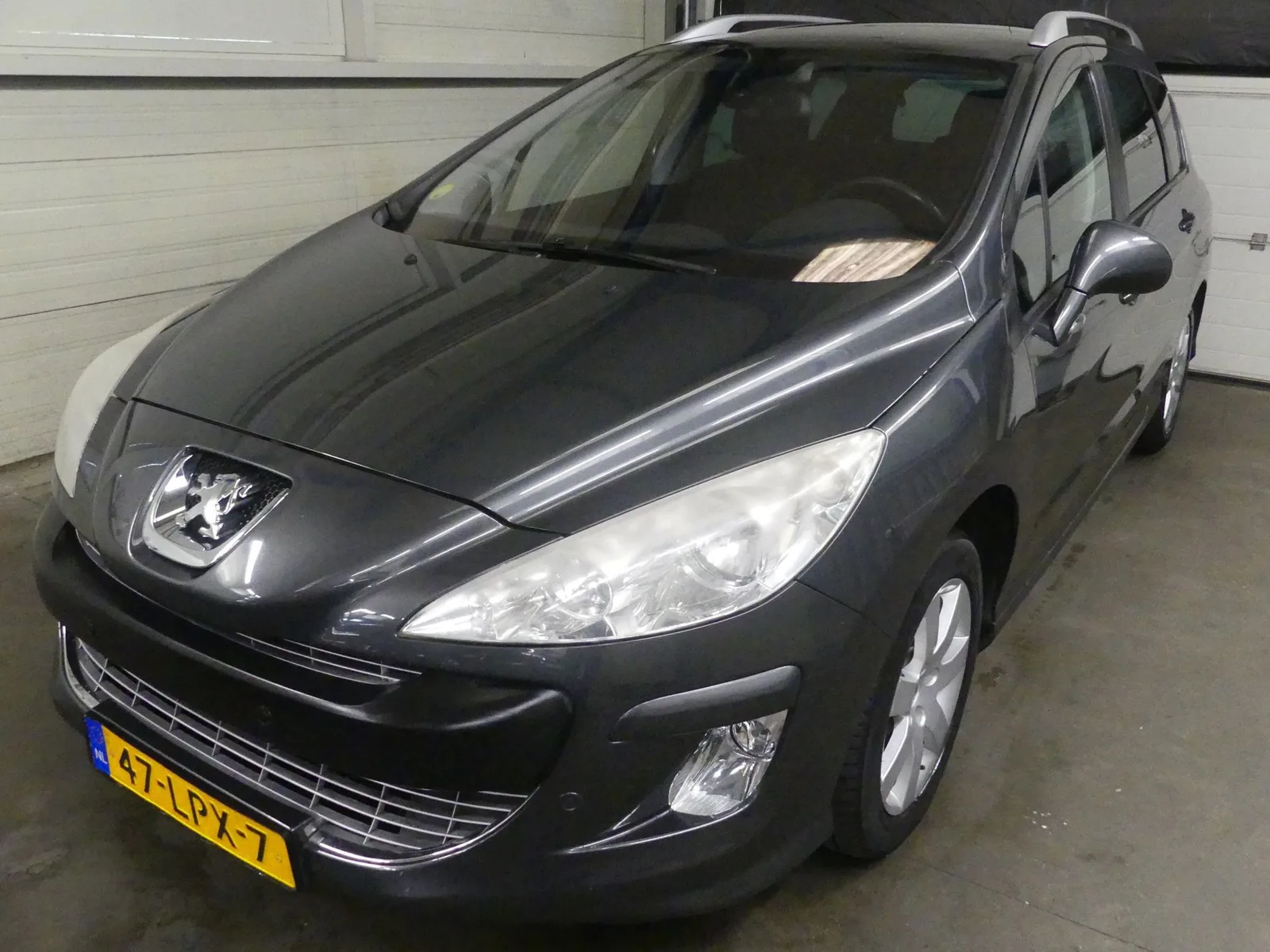 Peugeot 308 (2010) — foto 1