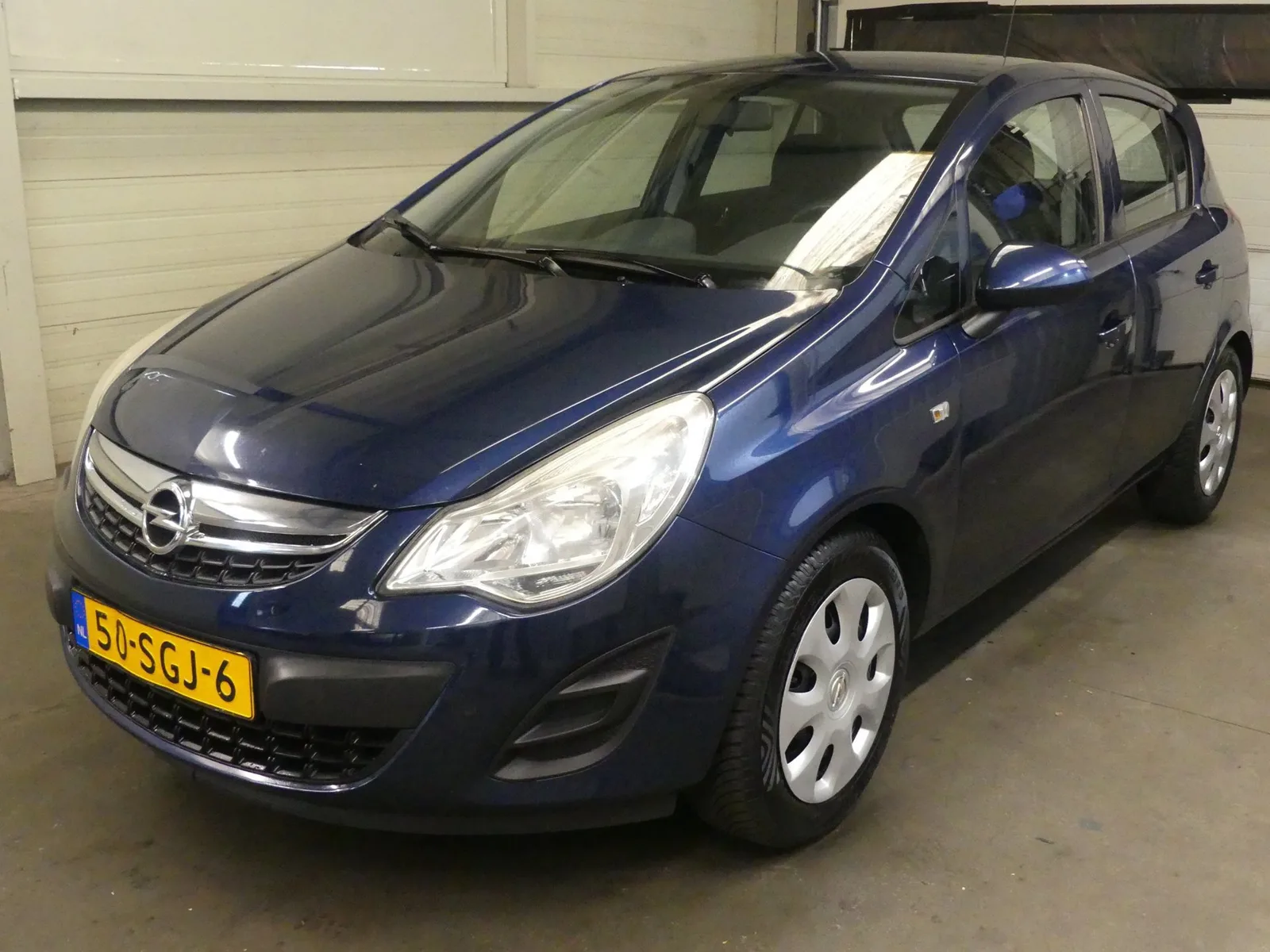 Opel Corsa (2011) — foto 1