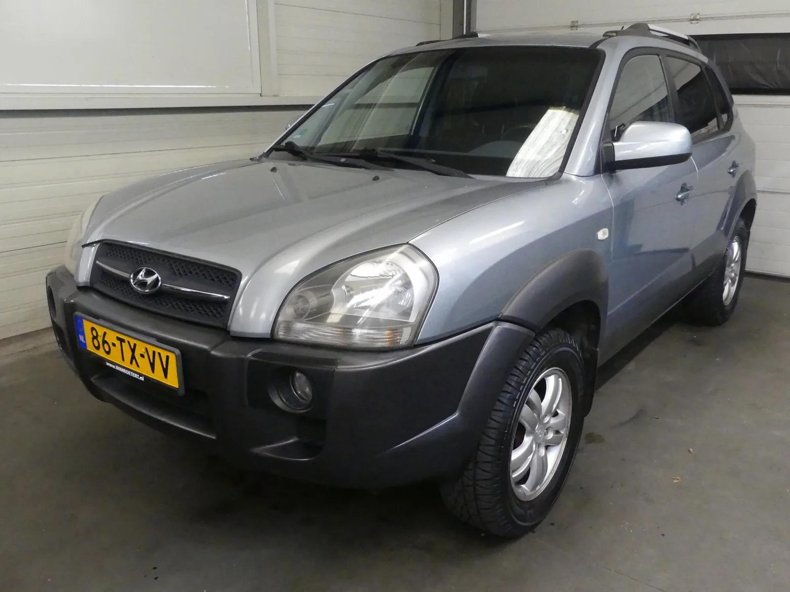 Hyundai Tucson (2007) — foto 1