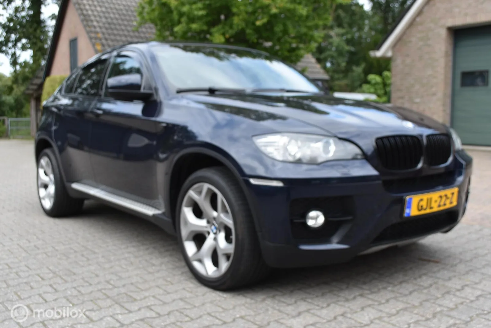 BMW X6 (2009) — foto 1
