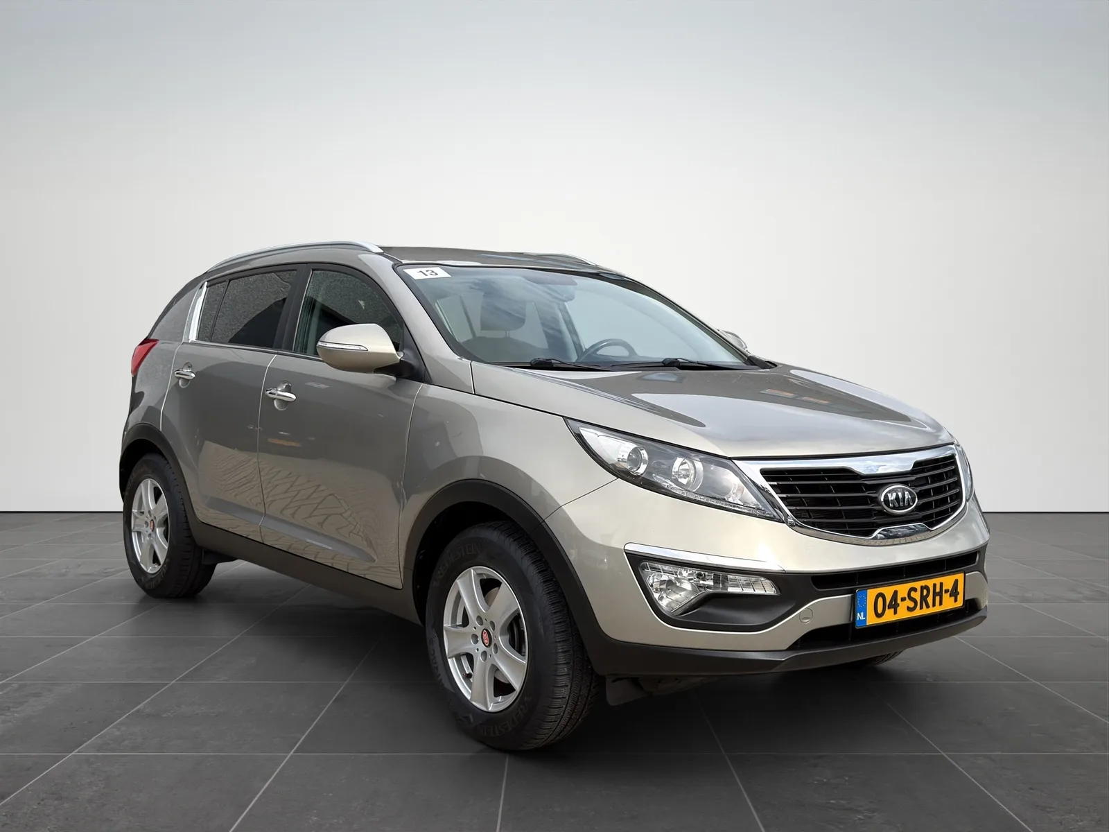Kia Sportage (2011) — foto 1