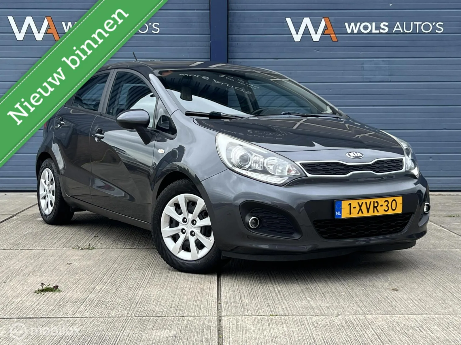 Kia Rio (2015) — foto 1