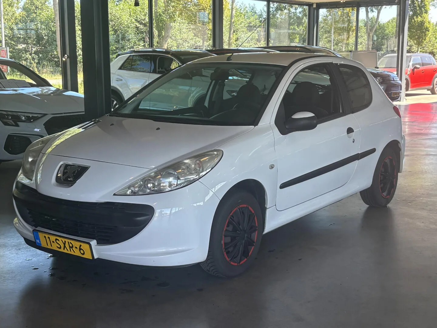 Peugeot 206 (2012) — foto 1