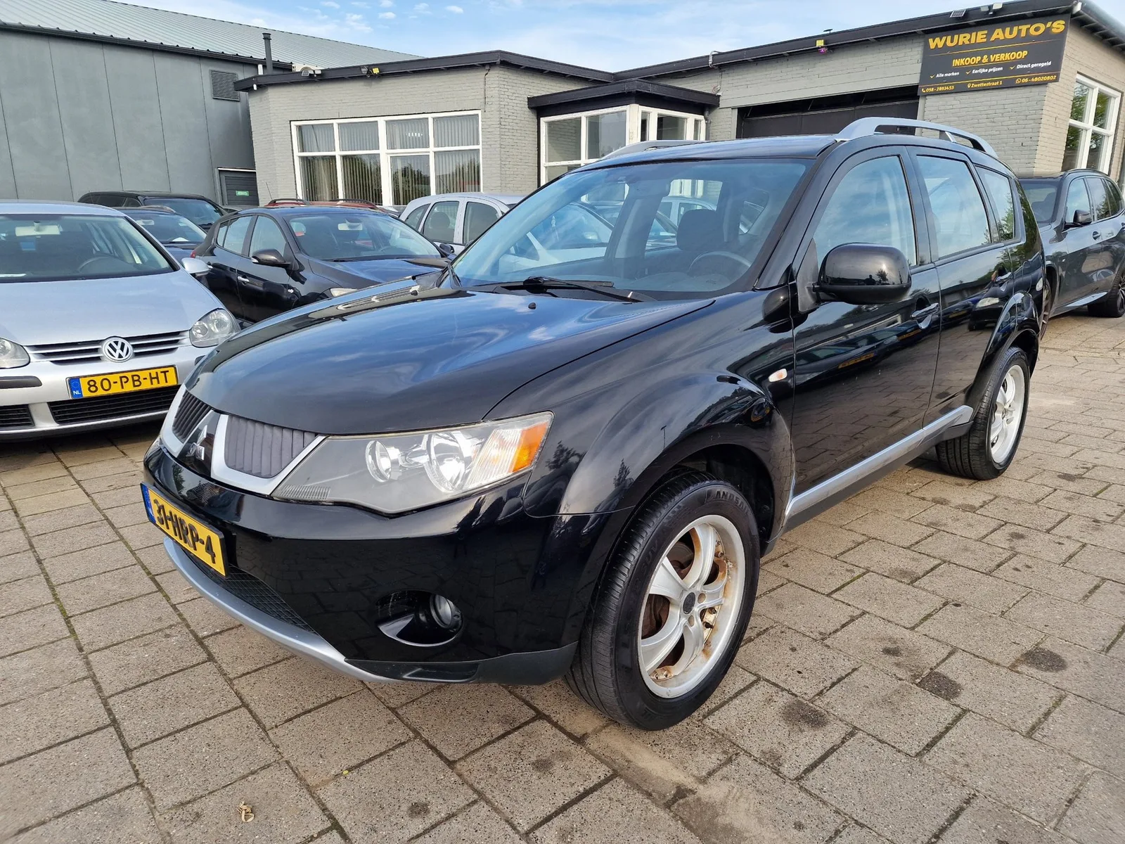 Mitsubishi Outlander (2009) — foto 1