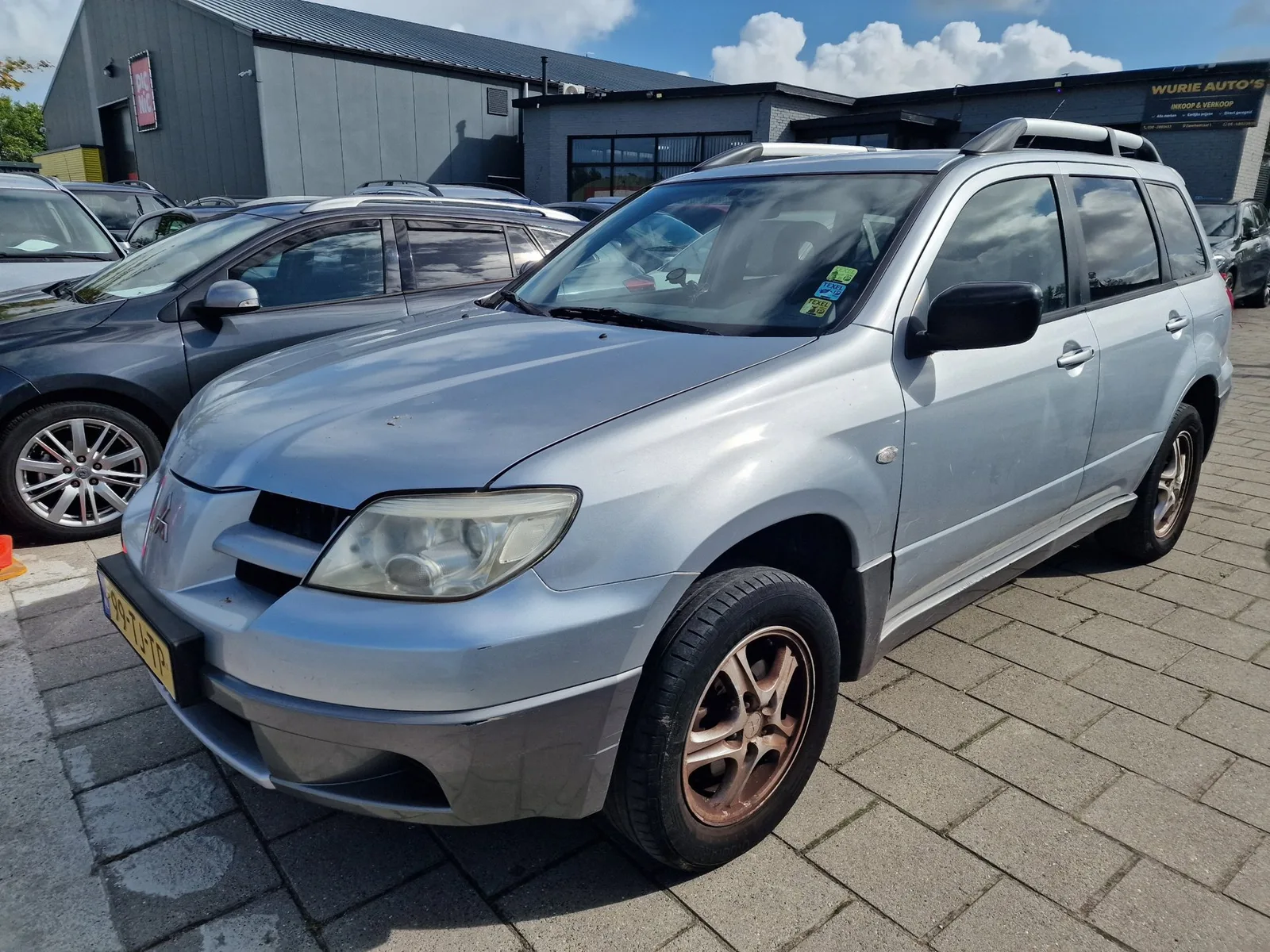 Mitsubishi Outlander (2006) — foto 1
