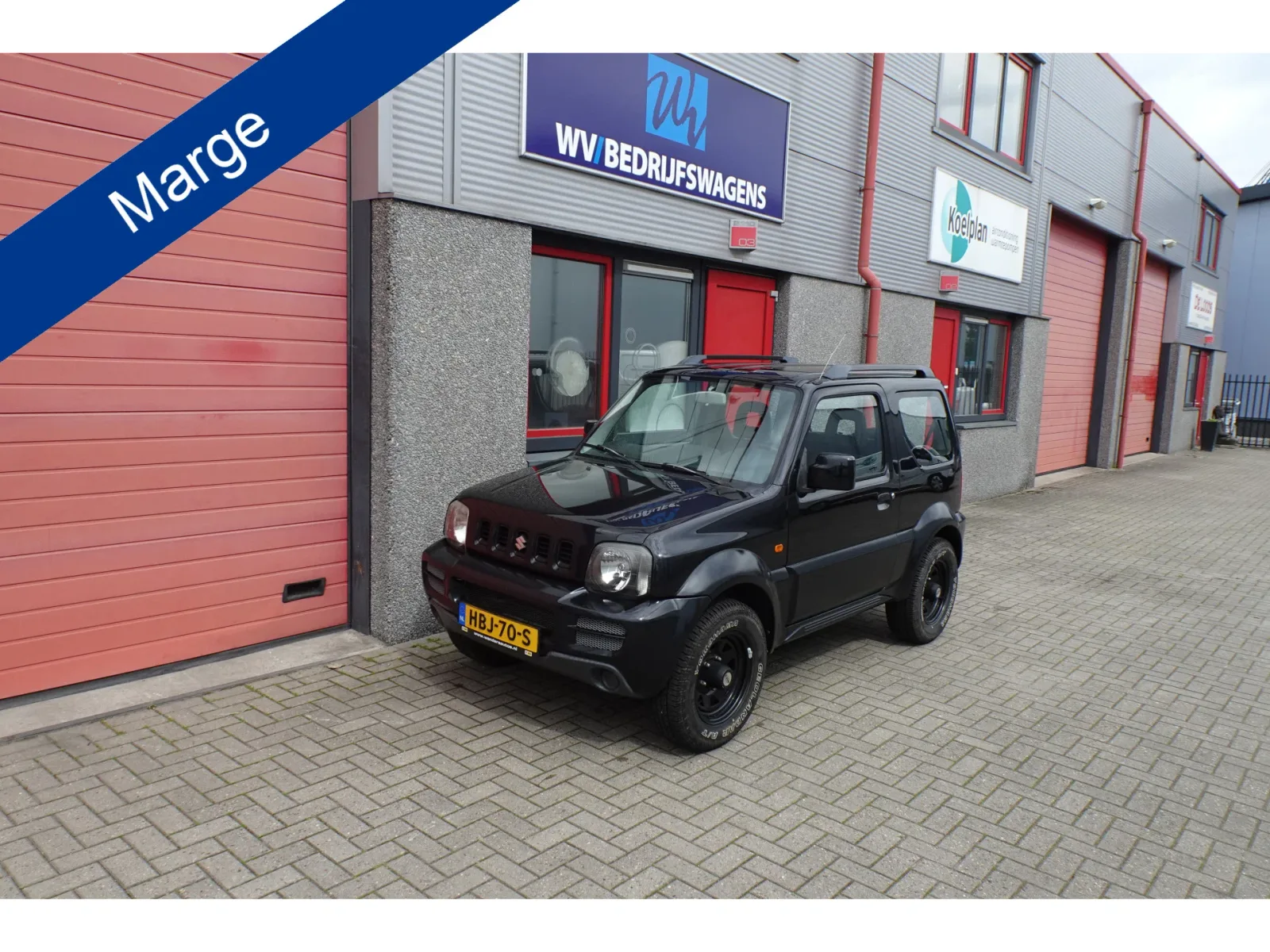 Suzuki Jimny (2009) — foto 1