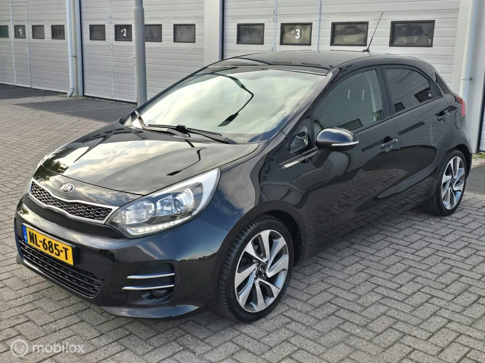 Kia Rio (2017) — foto 1