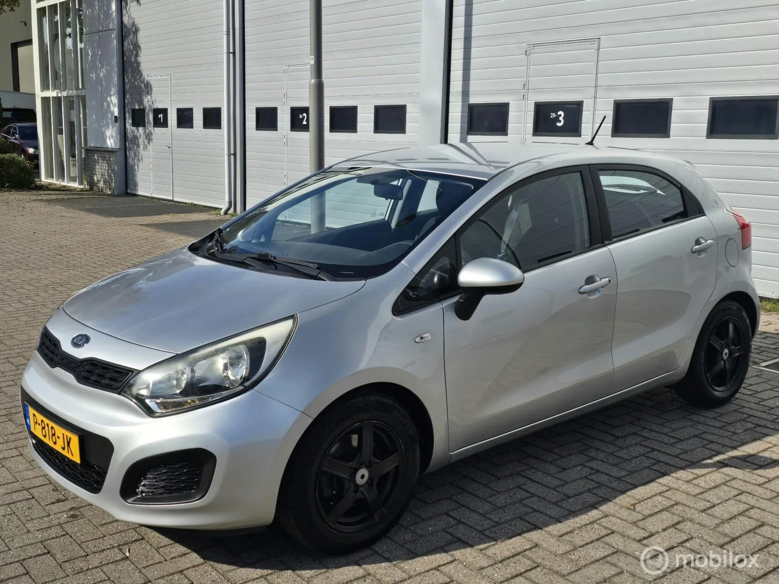 Kia Rio (2013) — foto 1