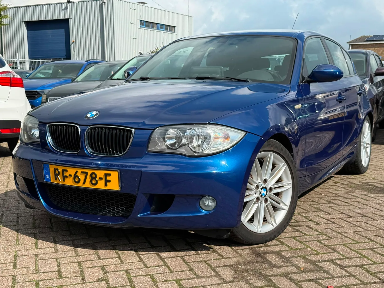 BMW 1-Serie (2009) — foto 1