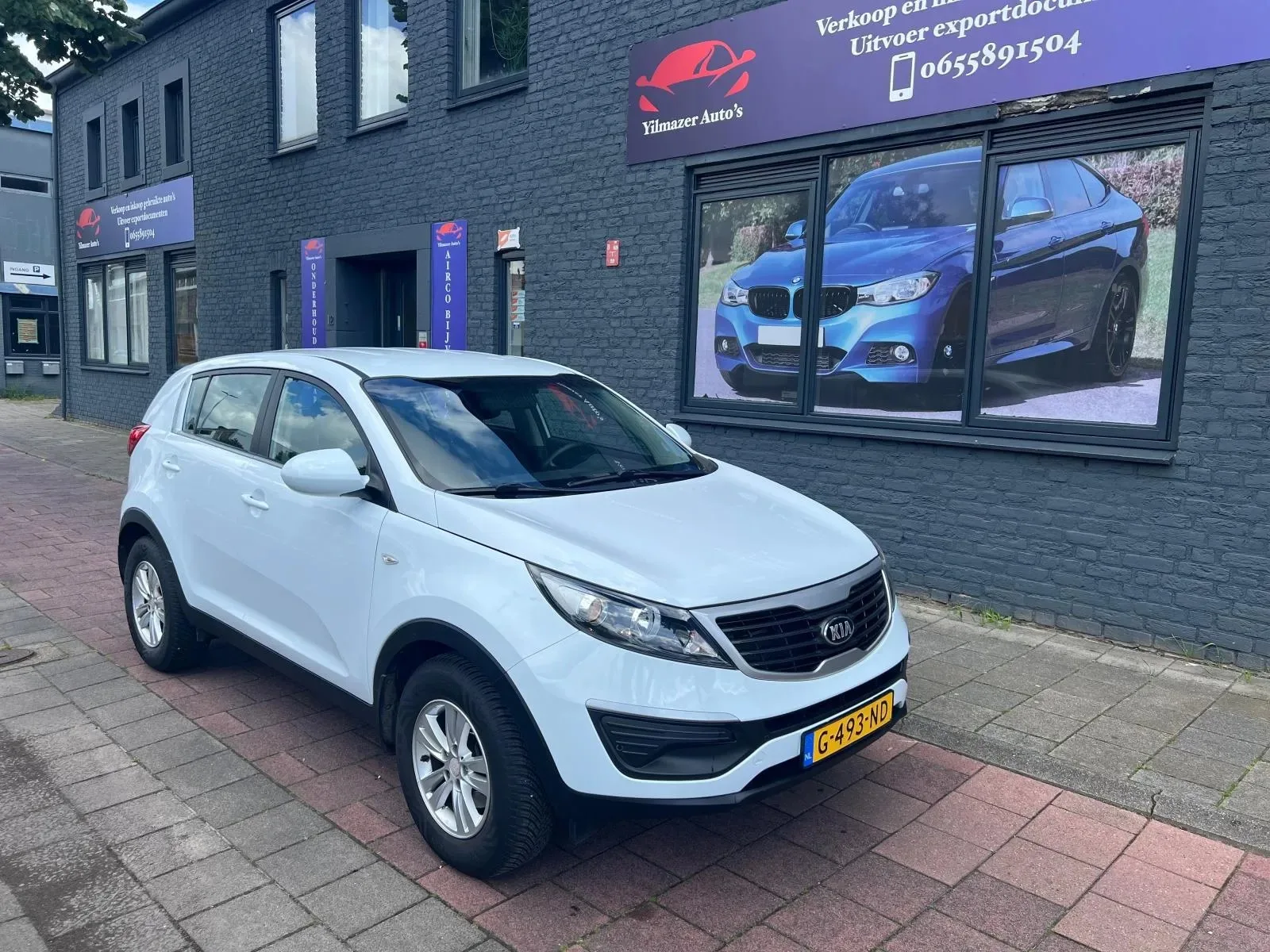 Kia Sportage (2013) — foto 1