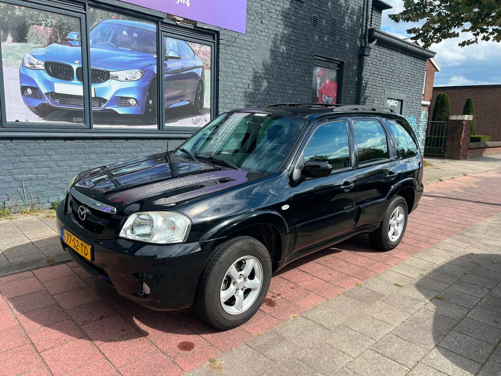 Mazda Tribute (2006) — foto 1