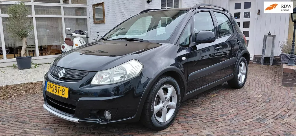 Suzuki SX4 (2008) — foto 1