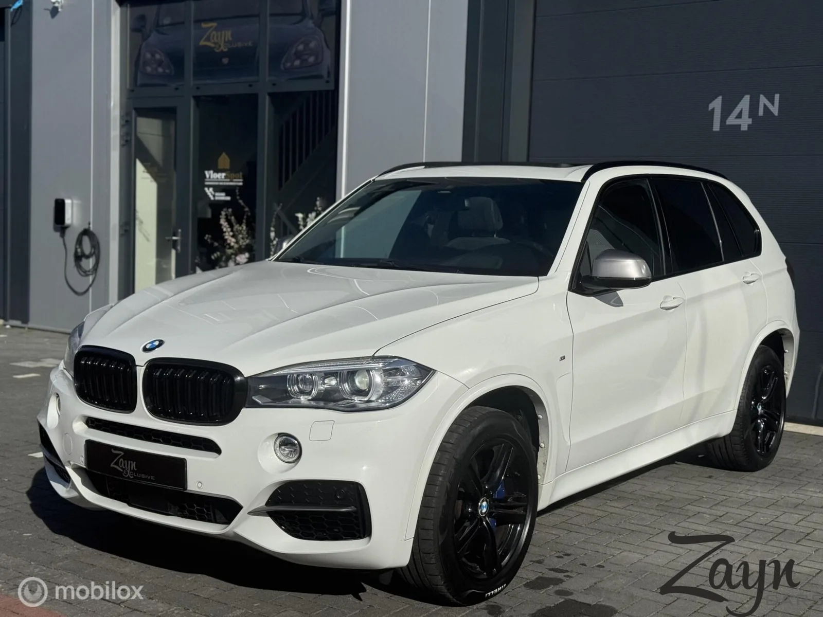 BMW X5 (2015) — foto 1