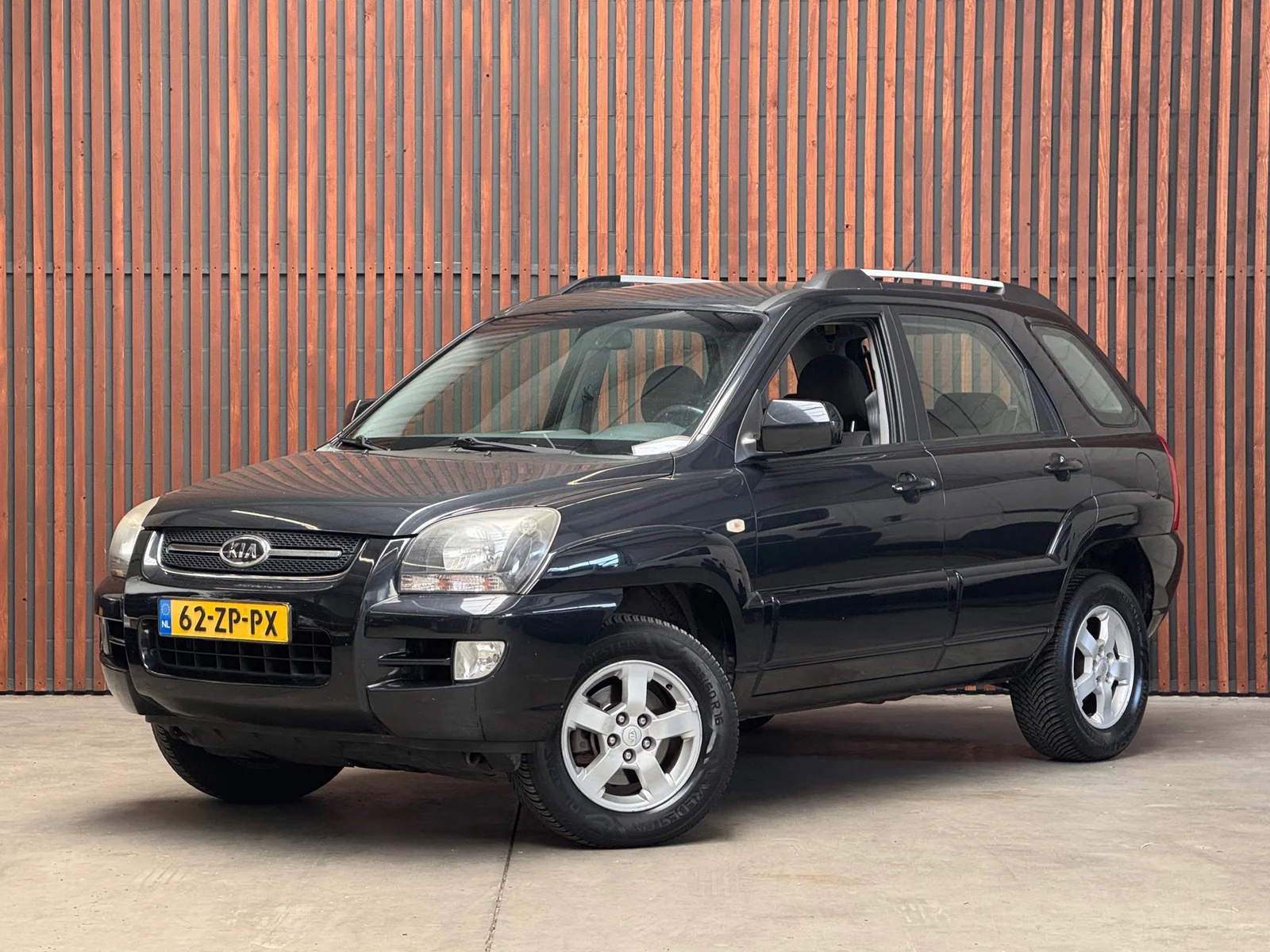 Kia Sportage (2008) — foto 1